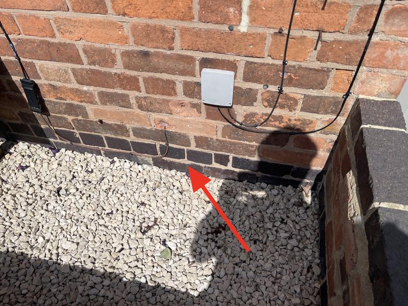 Old blue brick damp proof course